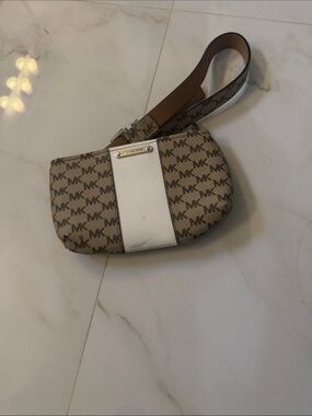 Michael Kors Tan Monogram Wristlet with White Center Stripe